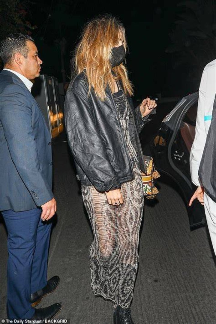 Outfit:&nbsp;Suki, 29, donned a sheer midi dress with a patterned detail which she wore over a black crop top and matching bottoms
